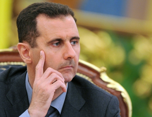 Syria's president Bashar al-Assad gives