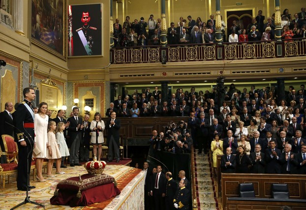 Spain's new King Felipe VI his wife Queen Letizia Princess Sofia and Princess Leonor attend the swearing-in ceremony at the Congress of Deputies in Madrid