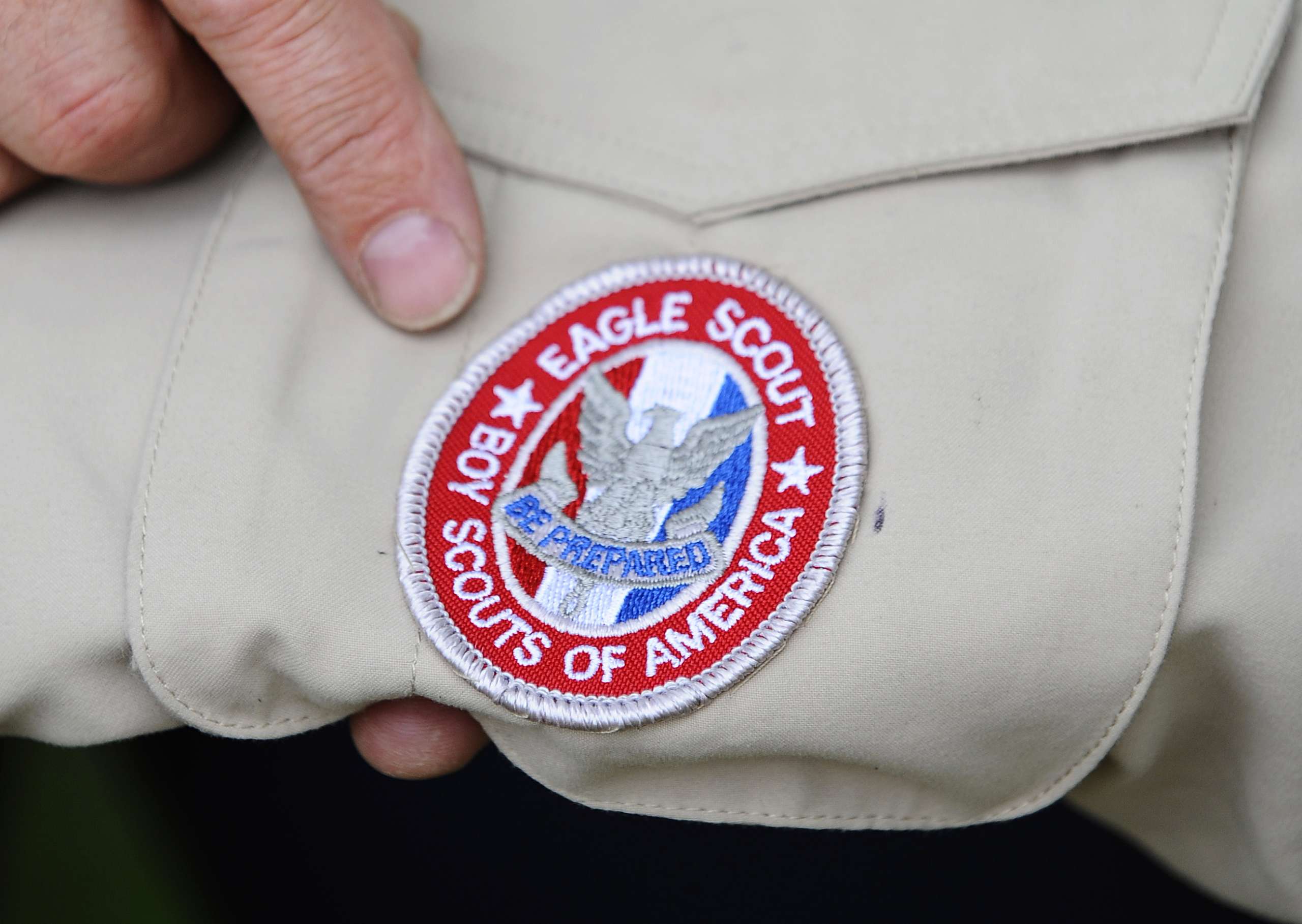 epa08225658 (FILE) - A badge of the Boy Scouts of America is photographed in Grapevine, Texas, USA, 23 May 2013 (reissued 18 February 2020). According to media reports, the Boy Scouts of America organisation has filed for bankruptcy in order to build a fund for victims of alleged sexual abuse within the organisation.  EPA/RALPH LAUER | 