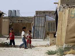 Niños palestinos de Irak juegan en el campo de refugiados Al-Hol en la provincia de Hasaka al norte de Siria