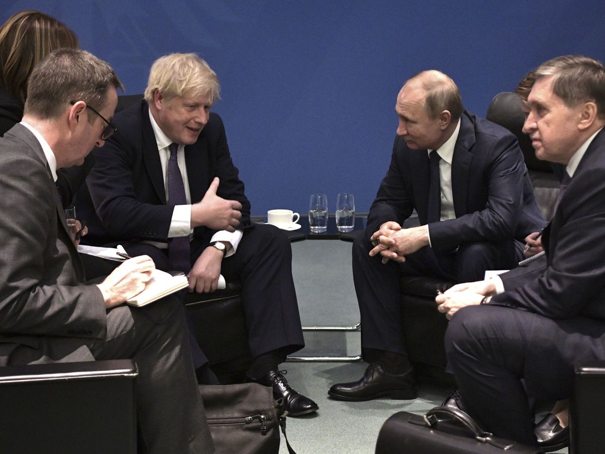 Boris Johnson y Vladimir Putin en una imagen de archivo.