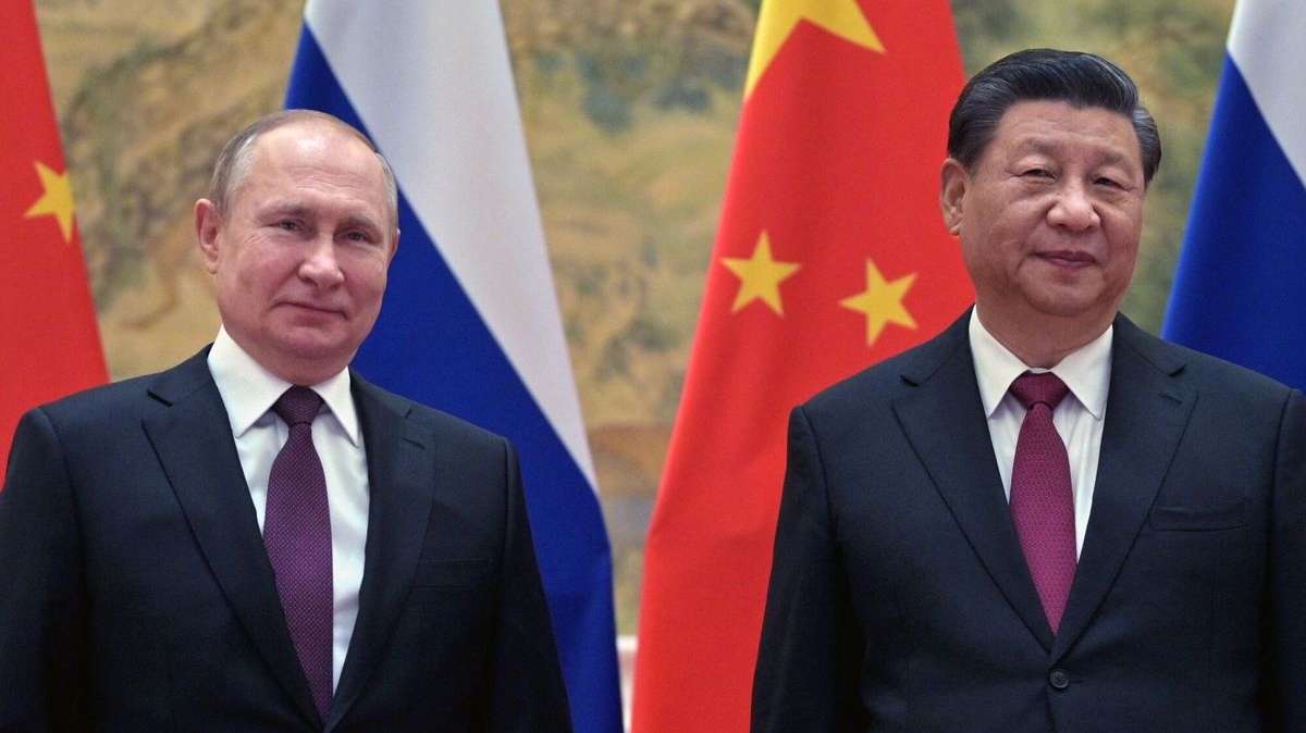 El presidente de Rusia, Vladimir Putin, junto al de China, Xi Jinping, en una reunión.